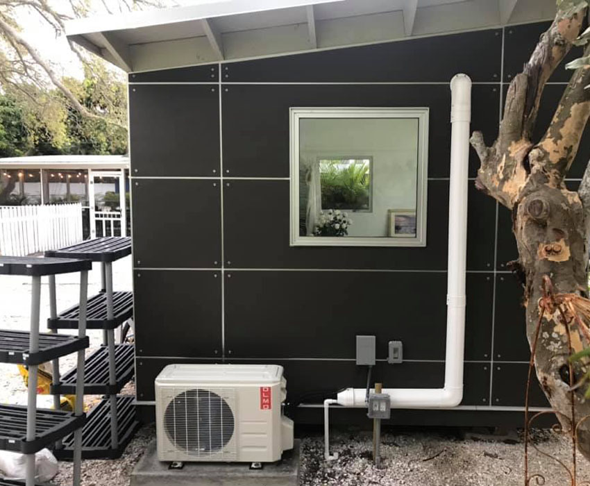 A picture of an outdoor AC unit not blowing cold air