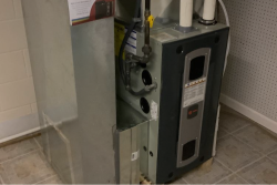 Heater settings exposed - Streamline Heating and Air The back of a heater with settings exposed