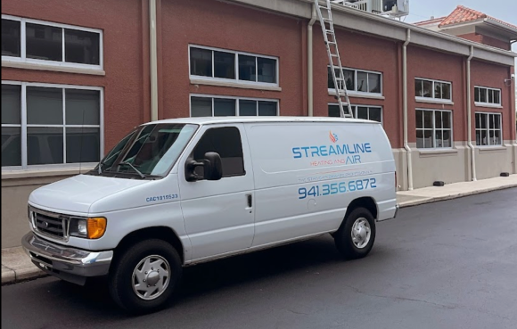 The Streamline Air van parked in front of a building