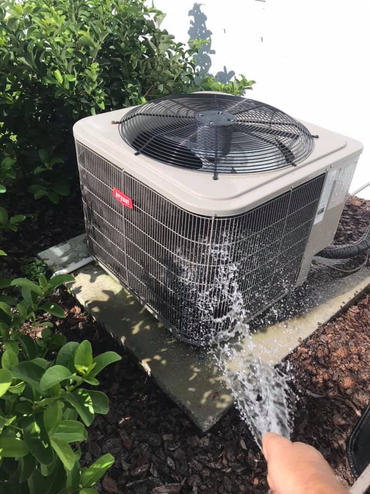 Cleaning coils on an air conditioner